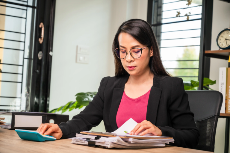 A focused professional managing Philippine tax forms and simplify BIR compliance for their business.